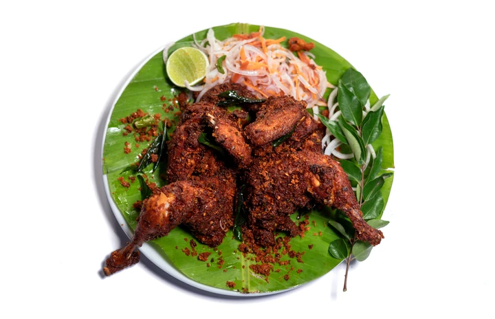 Kunji Kozhi — signature dish at Aaraamam Restaurant, Dubai
